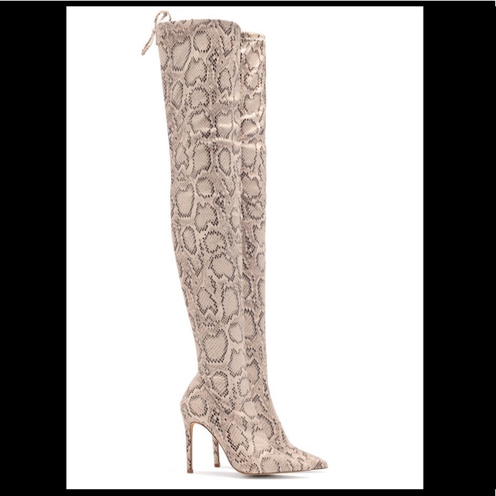 Snakeskin print above knee high heel boots
